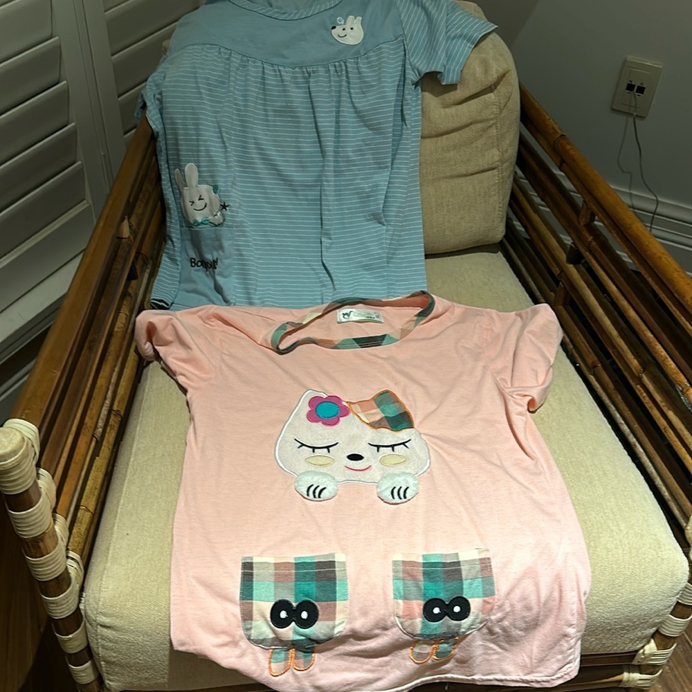 Great deal!  Two kids large and extra large pajama tops. Super cute detailing.